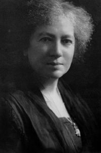 Black and white portrait photograph of Dame Maria Gordon. She is looking into the camera.