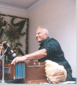 Pandit Purshottam Walwalkar playing the Harmonium