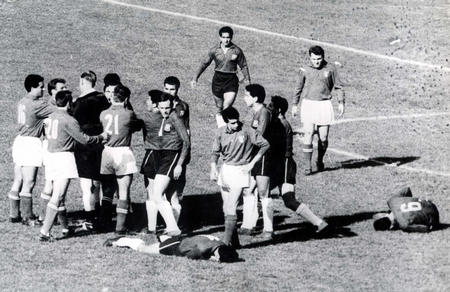 Players fighting at the 1962 FIFA World Cup game named "The Battle of Santiago"