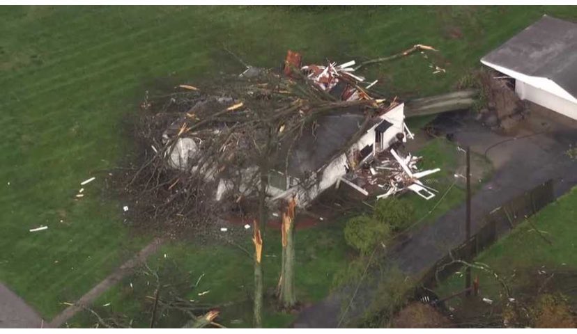 EF2 damage to a tree that was uprooted and fell on a home in Prospect.