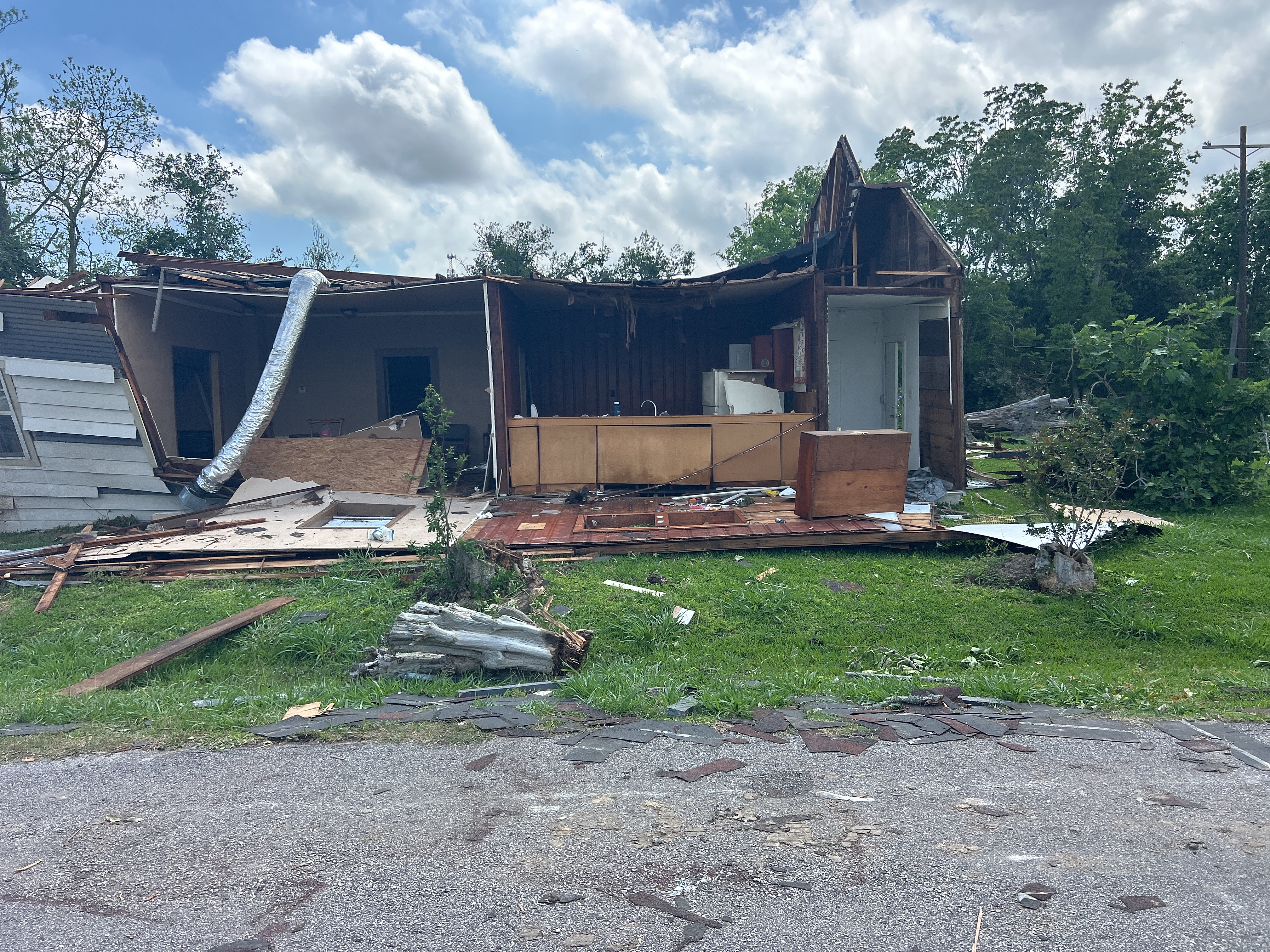 A home that was heavily damaged at low-end EF2 intensity in Port Arthur, Texas.