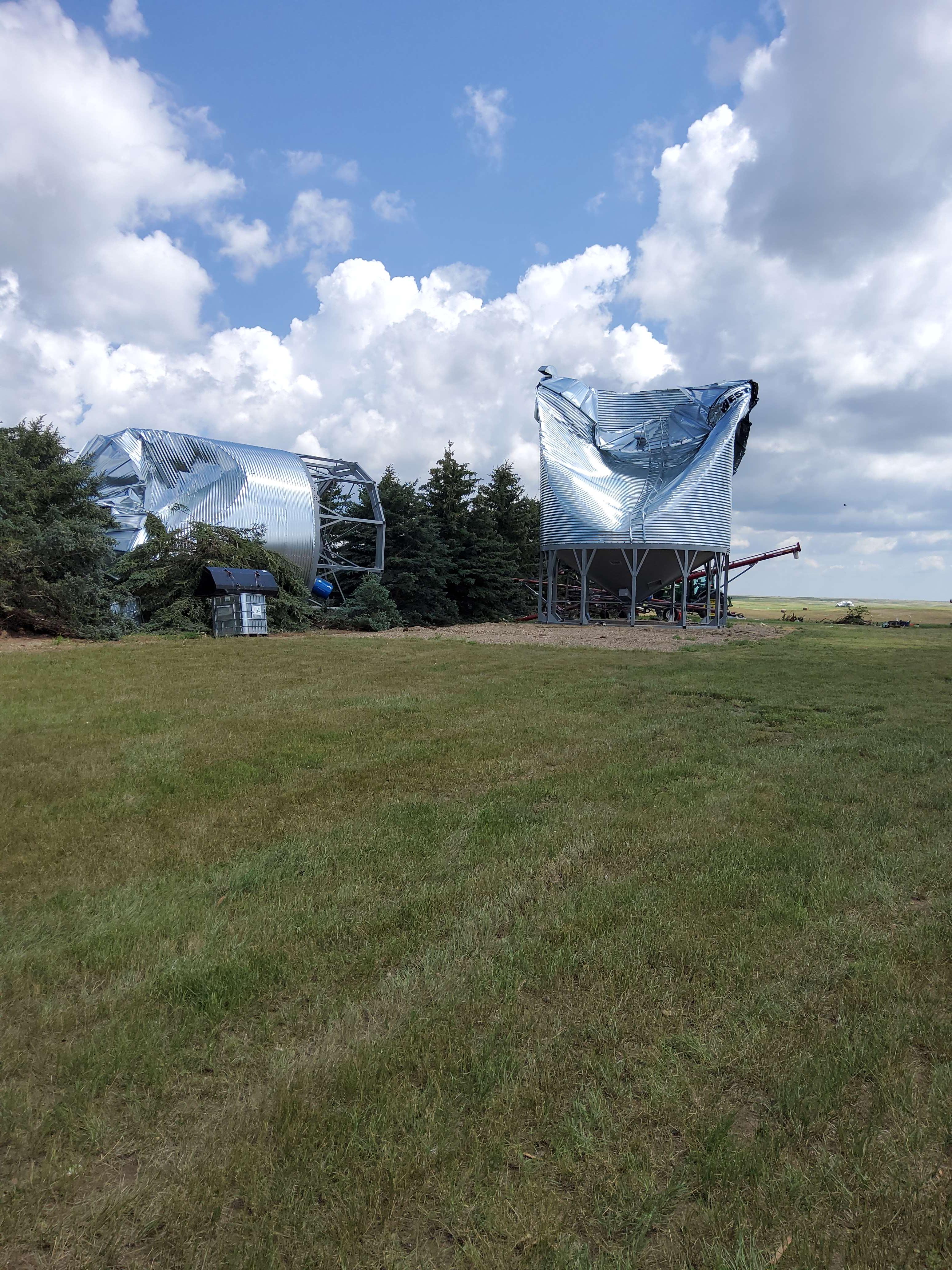 Heavily damaged or destroyed grain bins in Glentana, Montana due to an EF2 tornado.