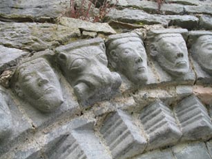 Detail of carved heads over the door in Dysert O'Dea Church