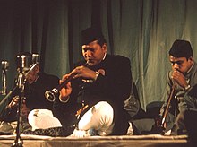 Khan at a music concert (1964)