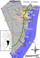 Location of Toms River in Ocean County highlighted in yellow (right). Inset map: Location of Ocean County in New Jersey highlighted in black (left).