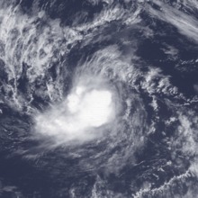 A satellite image of a minimal tropical storm over the Eastern Pacific Ocean