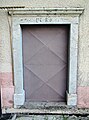 Sacristy door of the church, dated 1780