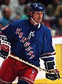 Image 5 Wayne Gretzky Photo credit: Håkan Dahlström Ice hockey player Wayne Gretzky, as a member of the New York Rangers of the National Hockey League (NHL) in 1997. Gretzky, nicknamed "The Great One", is widely considered the best hockey player of all time. Upon his retirement in 1999, he held forty regular-season records, fifteen playoff records, and six All-Star records. He is the only NHL player to total over 200 points in one season—a feat he accomplished four times. In addition, he tallied over 100 points in 15 NHL seasons, 13 of them consecutively. He is the only player to have his number (99) officially retired by the NHL for all teams. More selected portraits