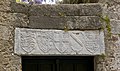 A lintel on the Street of the Knights of Rhodes, featuring the coat of arms of the Knights of Rhodes (in the center), flanked by the coats of arms of Grand Masters Hélion de Villeneuve (r. 1319–1346) and Dieudonné de Gozon (r. 1346–1353), again flanked by the coats of arms of England and of king Edward III of England, c. 1350.