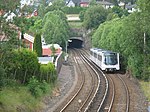 An Oslo T-bane train between Ulsrud and Oppsal stations.