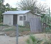 The abandoned farm house.