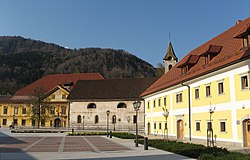 Stara Sava, the main square. From the left to the right, the Ruard Manor, Assumption of Mary Church, the Worker Barracks