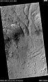 HiWish计划中由火星侦察轨道器的高分辨率成像科学设备 拍摄的阿尔及尔区表面。该影像拍摄区即位于涅瑞达山脉。本影像是来自高分辨率成像科学设备的单一影像，比例尺500米。