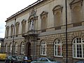 The side of the gallery showing the old entrance and statue of Queen Victoria