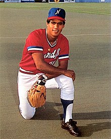 A baseball player in red, white and blue