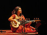 G-25. Sarod player Sudhesna Bhattacharya in concert at the Musée Guimet, Paris.