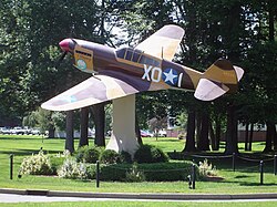 A replica Curtiss P-40 Warhawk on static display at Hanscom AFB.