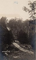 Car near the top of a dirt road near Ephraim; from a postcard postmarked in 1916