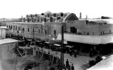 Black and white photo of Khan Murjan prior to restoration