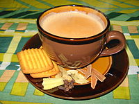 Northern India's most popular way to drink tea, masala chai, served with tea biscuits.