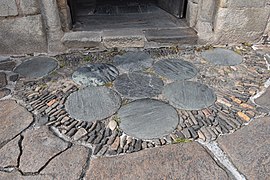 Pavement of forecourt of Abbaye Saint-Pierre of Uzerche, France