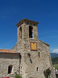 The bell tower and sundial of the church