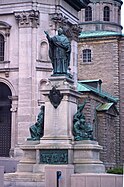 Bishop of Montreal, Ignace Bourget Monument (1903) is in front of Mary, Queen of the World Cathedral