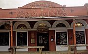 The Big Nose Kate's Saloon was once the Grand Hotel. The original building was built in 1881 and is located at 417 E Allen St. The saloon was listed in the National Register of Historic Places on October 15, 1966, as part of the Tombstone Historic District, reference #66000171.