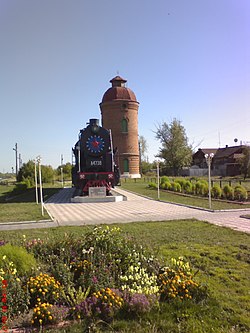 Water tower and train exhibit, village in Chistoozyorny District