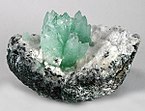 Isolated apophyllite cluster on contrasting matrix
