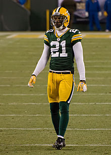 Photo of Woodson standing on a field during a game