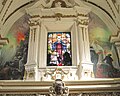 Stained glass and frescoes above main entrance.