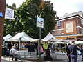 Sunday market and the Eltham town sign