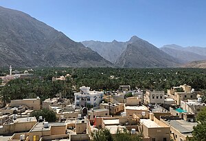 View of the town from Nakhal Fort, with Al Hajar Mountains in the background