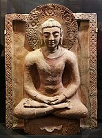 Buddha from the Kahu-Jo-Darro stupa at Mirpur Khas, Sindh, circa 410 CE. This is a conflation of the Greco-Buddhist art of Gandhara, and Gupta art.[80]