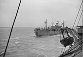 The first Allied convoy enters the port of Antwerp on 28 November 1944, led by the Liberty ship SS Samhope
