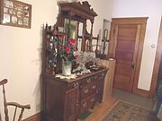 Bedroom in the first floor of the Manistee Mansion .