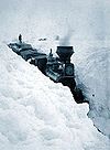 An 1881 picture showing snowdrifts in Minnesota larger than a locomotive