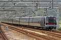 A Tung Chung line K-train approaching Sunny Bay station, bound for Hong Kong