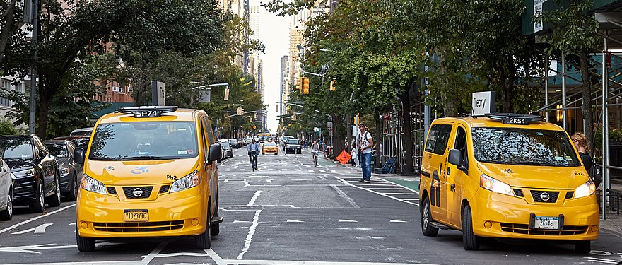 Shiny NY cabs on 5th Avenue near Washington Square