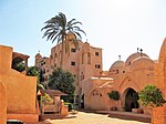 A monastery in a desert setting