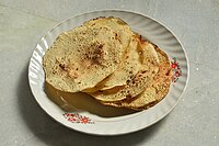 Fire-toasted papads, using lentils as a major ingredient