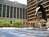 Richard J. Daley Center and Daley Plaza is Chicago's premier civic center and features a massive sculpture by Pablo Picasso. The modernist skyscraper courthouse is behind the sculpture and to the left is City Hall-County Building