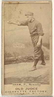 Standing man in baseball uniform