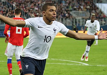 Kylian Mbappe celebrating his second goal for France on 27 March 2018.