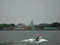 The entrance to the Magic Kingdom seen from a boat crossing the Seven Seas Lagoon