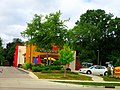 Taco John's with a tree-garden in front, Monona, Wisconsin