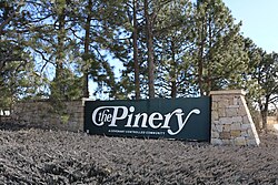 Entrance sign at North Pinery Parkway and State Highway 83.
