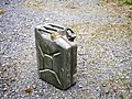 Jerrycan of fuel, WWII. Middle handle for empty can; two outer handles for two people carrying full can.