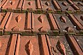 Interlocking tiles with a diamond-shaped pattern.